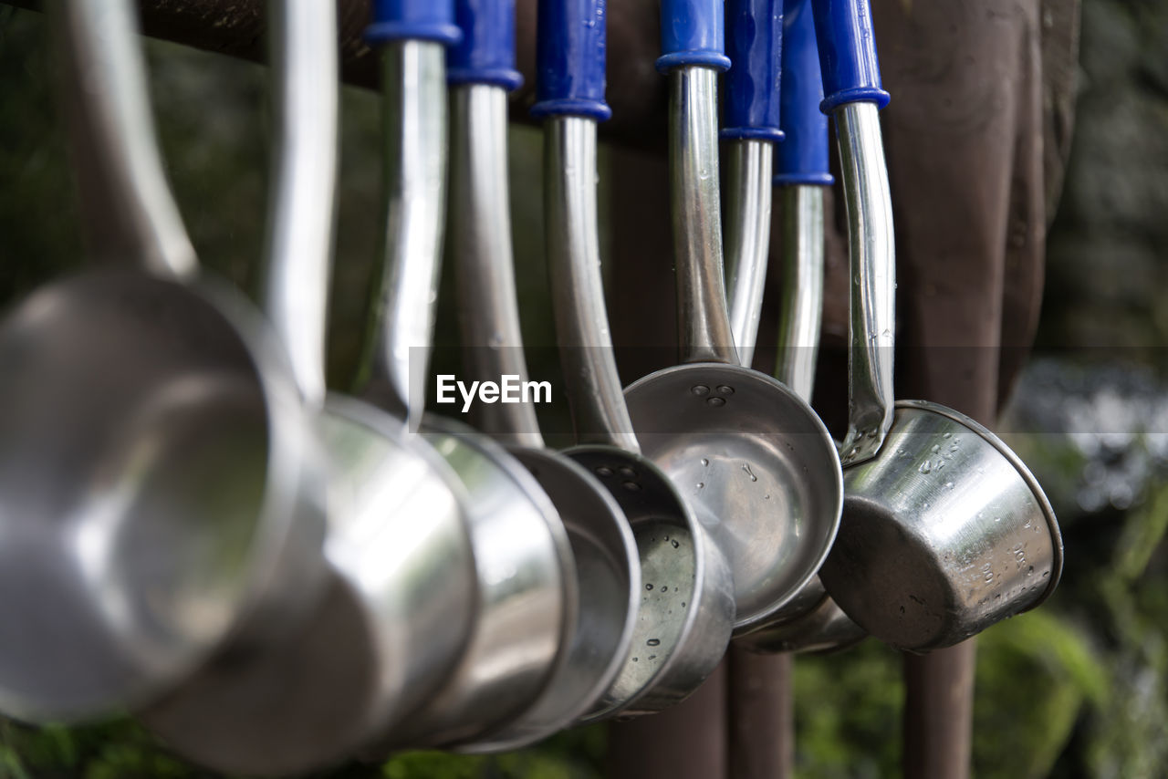 Close-up of wet utensils hanging at jeolmul natural recreation forest