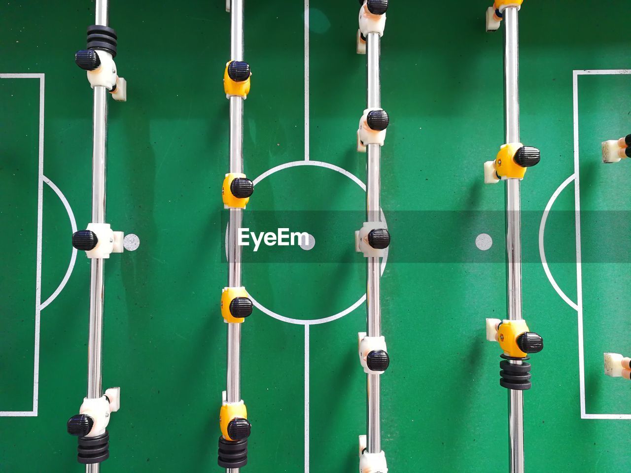 Full frame shot of figurines on foosball board