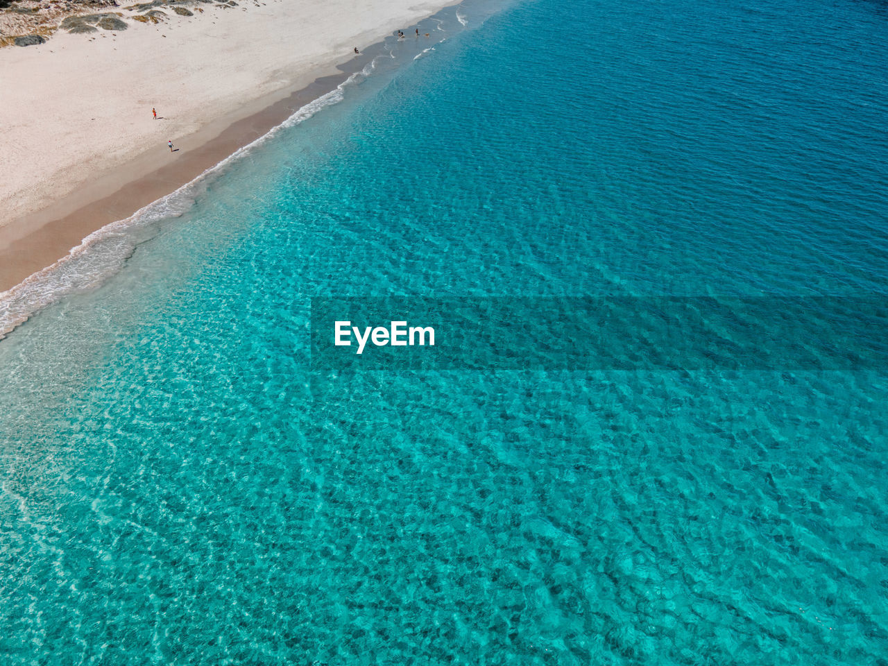 HIGH ANGLE VIEW OF SWIMMING POOL ON BEACH