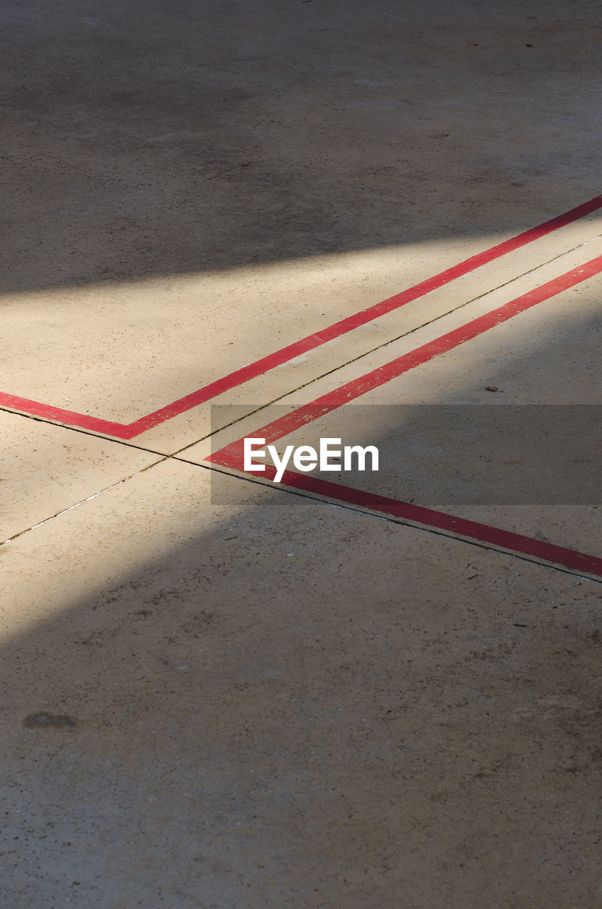 High angle view of red markings on road