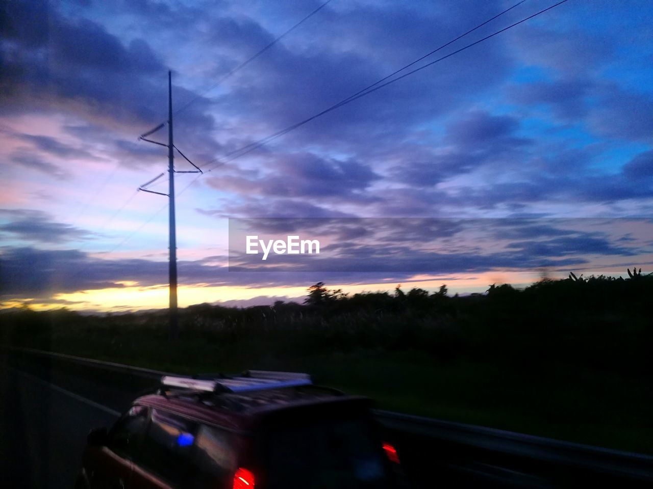 WIND TURBINES AGAINST SKY