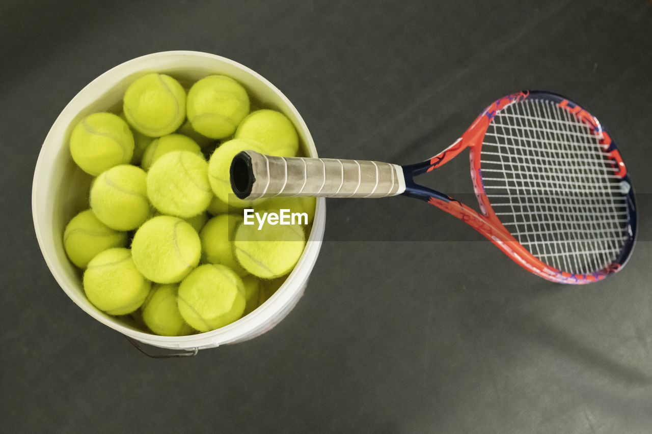 Tennis balls and tennis racquet