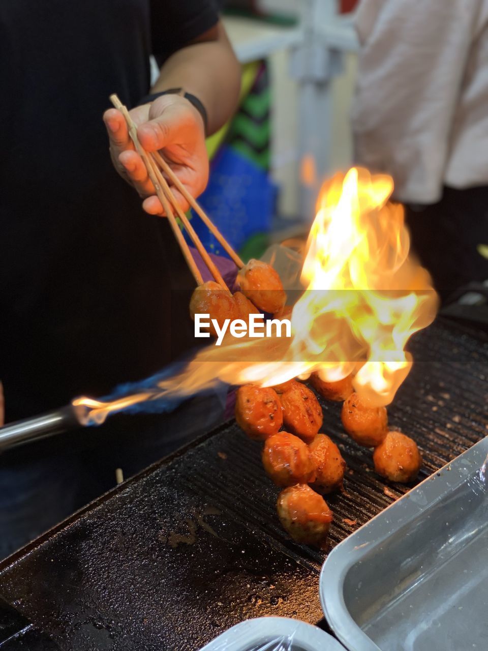 midsection of man preparing food at table