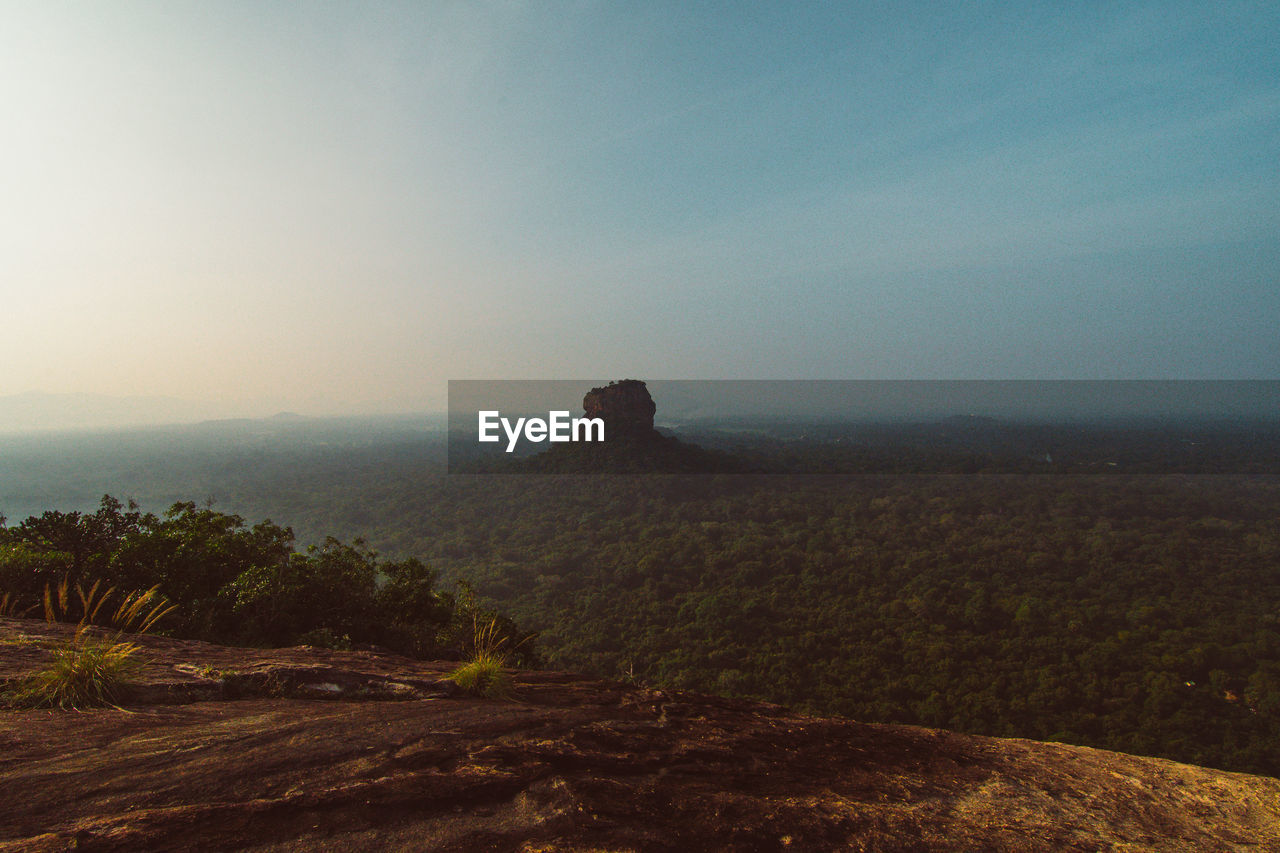 Scenic view of land against sky