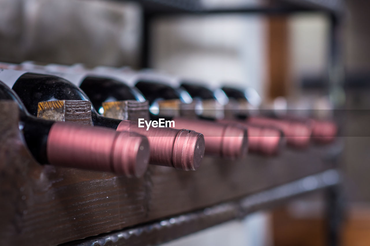 Close-up of wine bottles