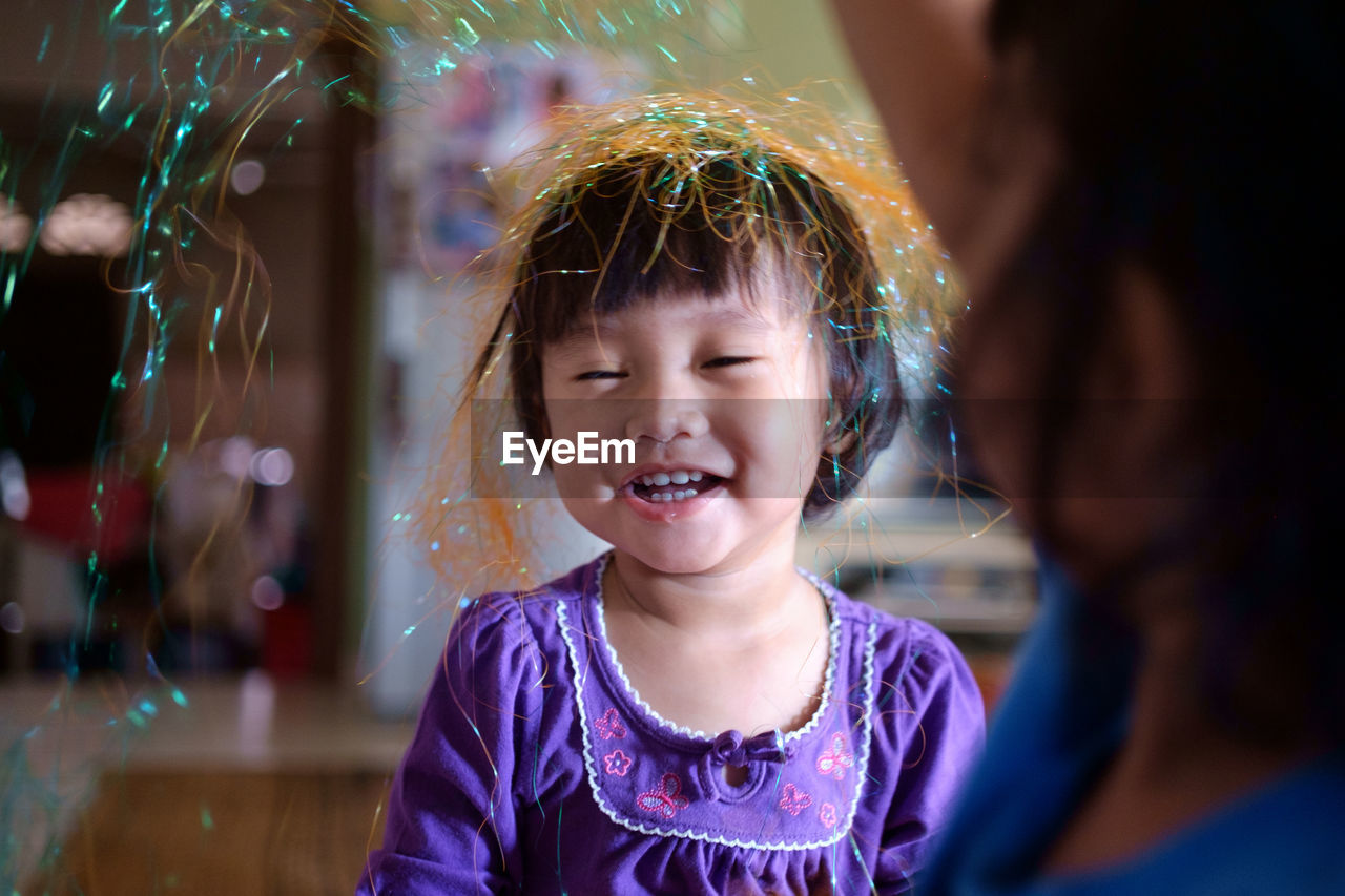 Close-up of girl smiling