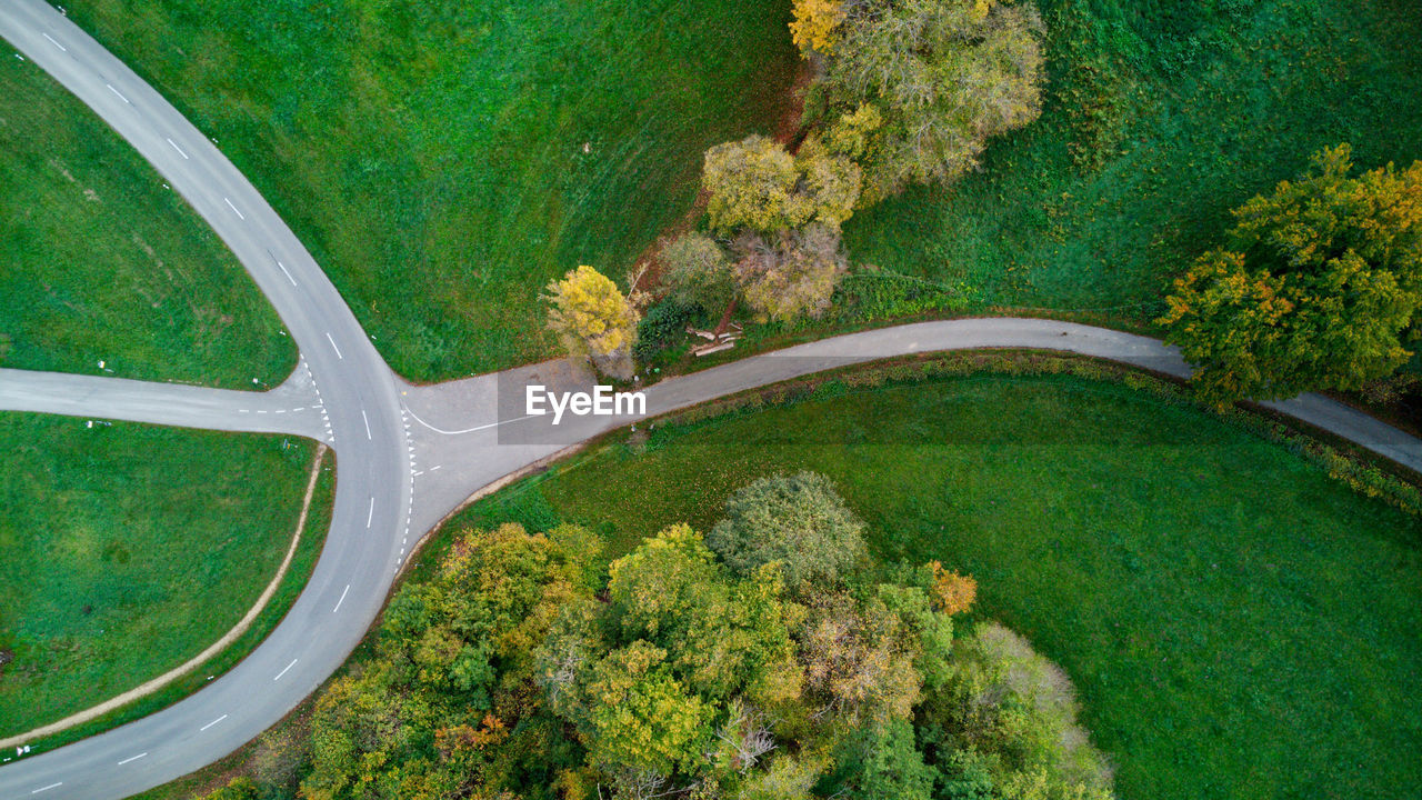 aerial photography, aerial view, plant, green, high angle view, nature, no people, land, transportation, environment, road, tree, beauty in nature, water, scenics - nature, growth, day, landscape, outdoors, tranquility, grass, travel, curve, architecture