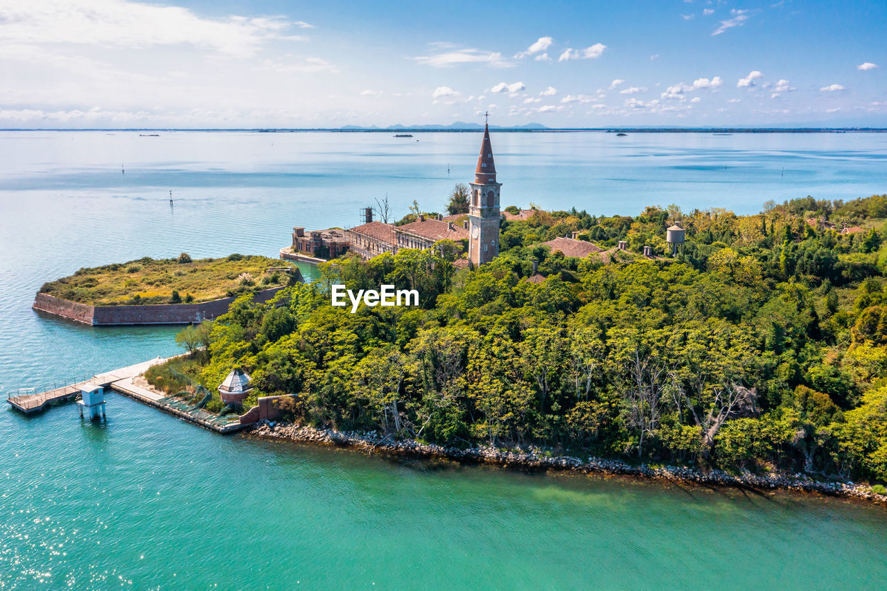 Aerial view of the plagued ghost island of poveglia in venice