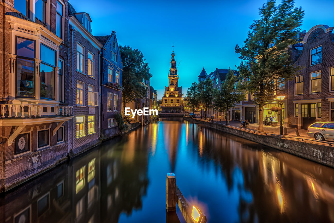 VIEW OF BUILDINGS IN FRONT OF WATER