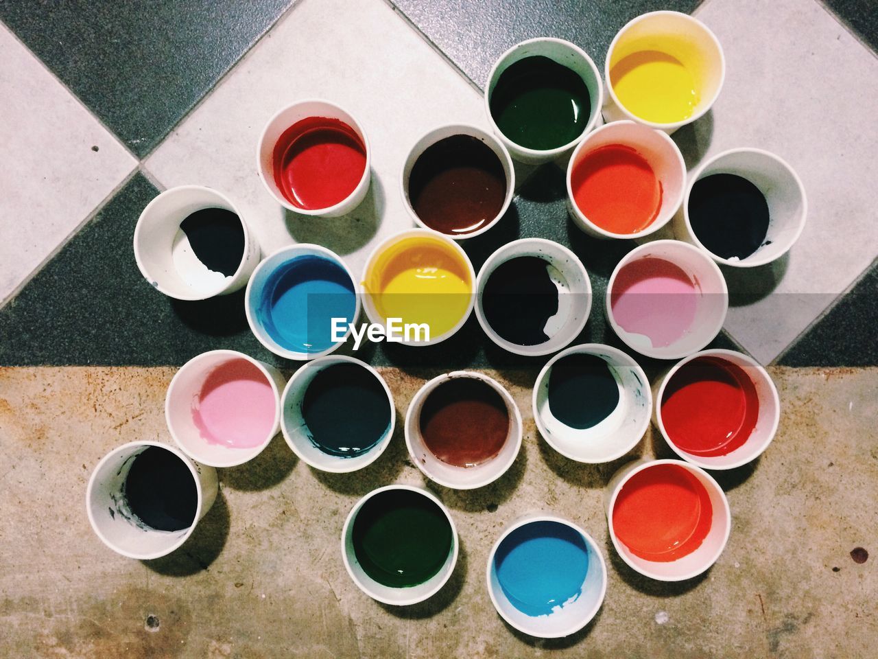 High angle view of multi colored cups