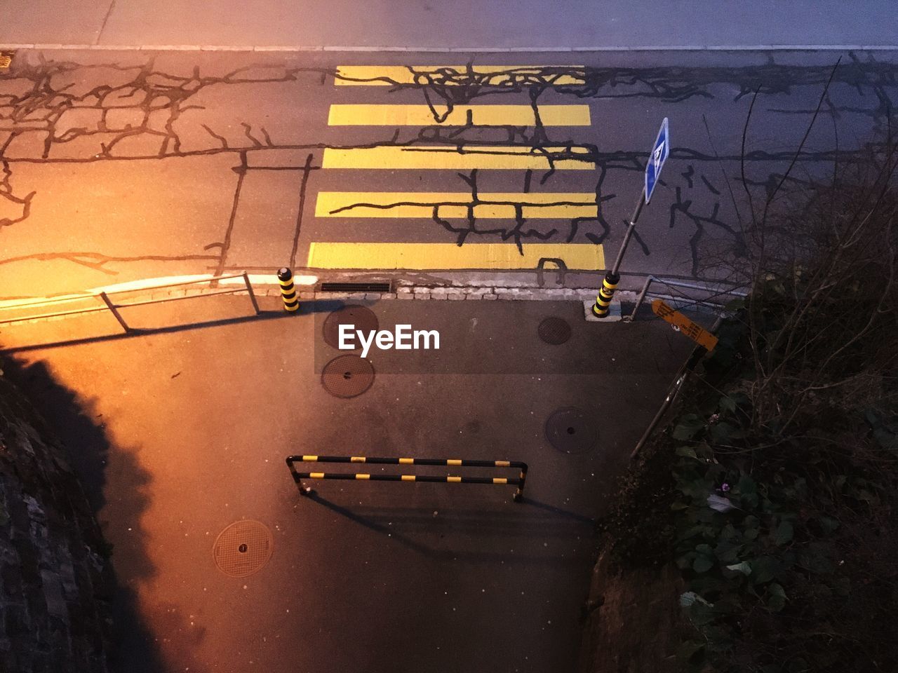 Close-up of pedestrian crossing in the dawn 