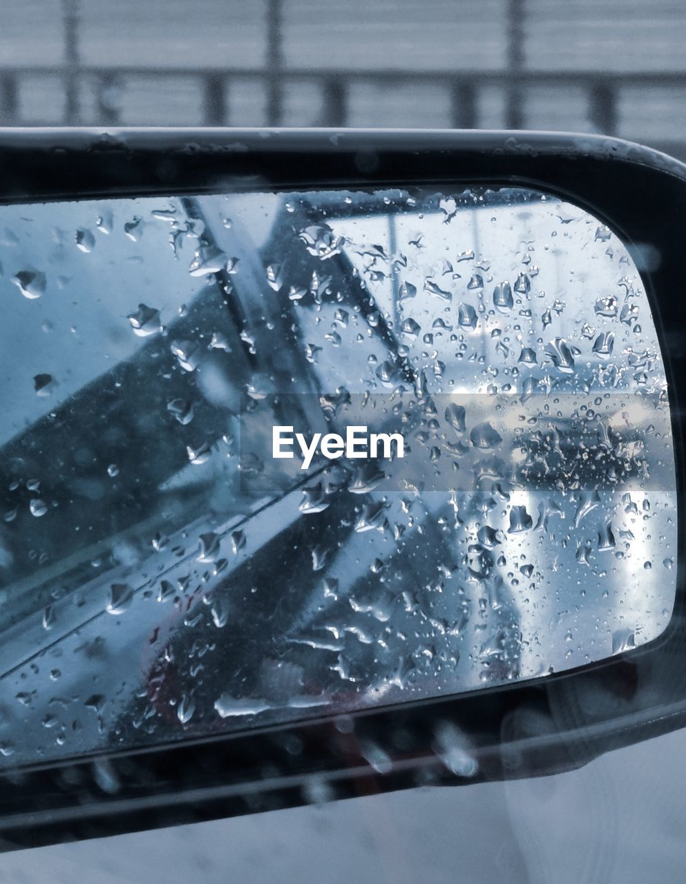 RAINDROPS ON GLASS WINDOW