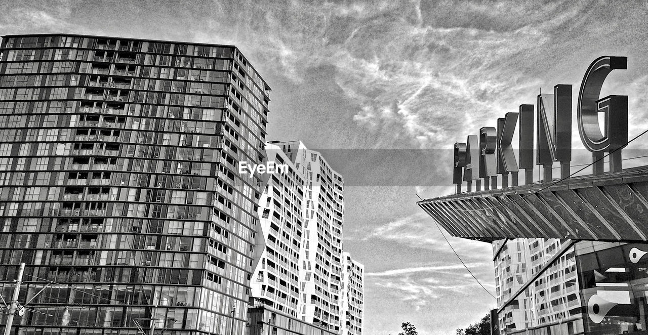 LOW ANGLE VIEW OF BUILDINGS AGAINST SKY