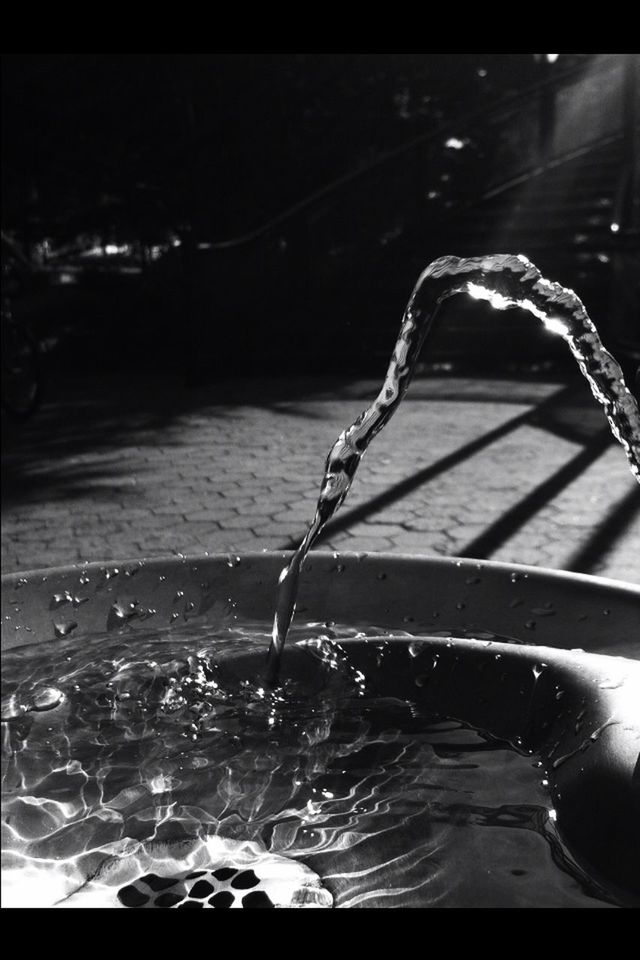 CLOSE-UP OF WATER SPLASHING ON WHITE BACKGROUND