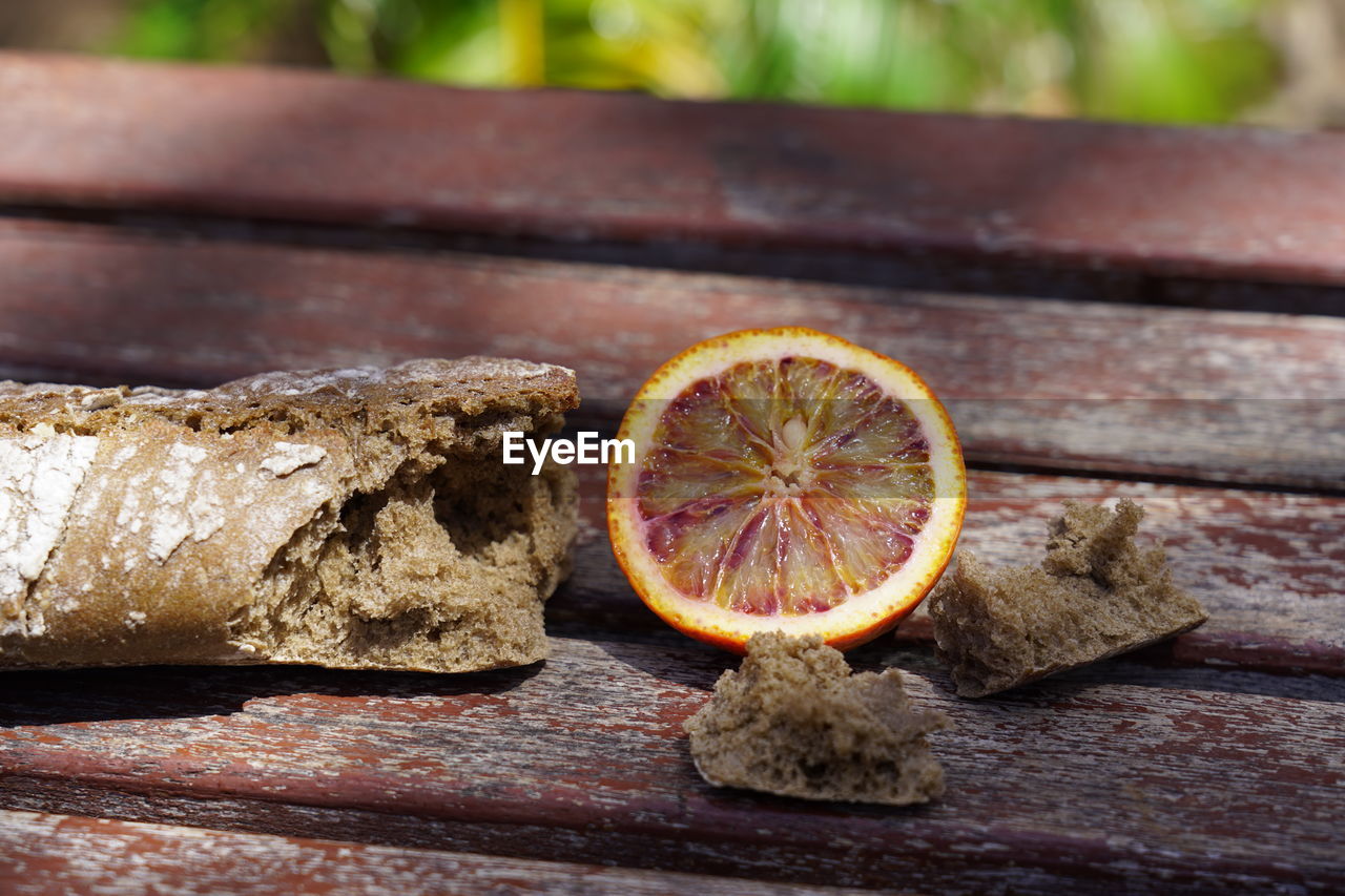 CLOSE-UP OF FRUITS ON TABLE