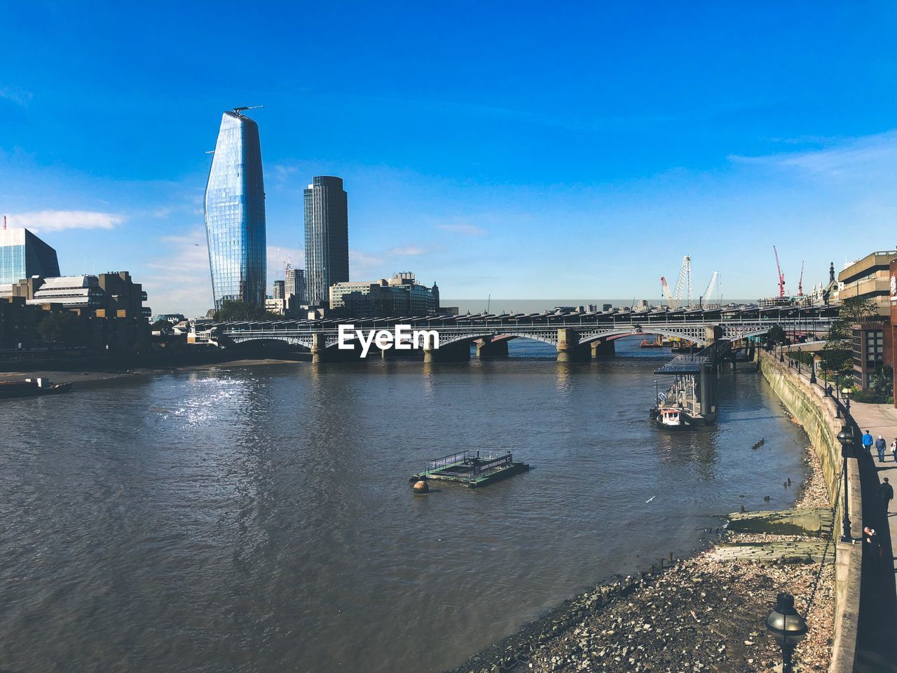 BRIDGE OVER RIVER IN CITY