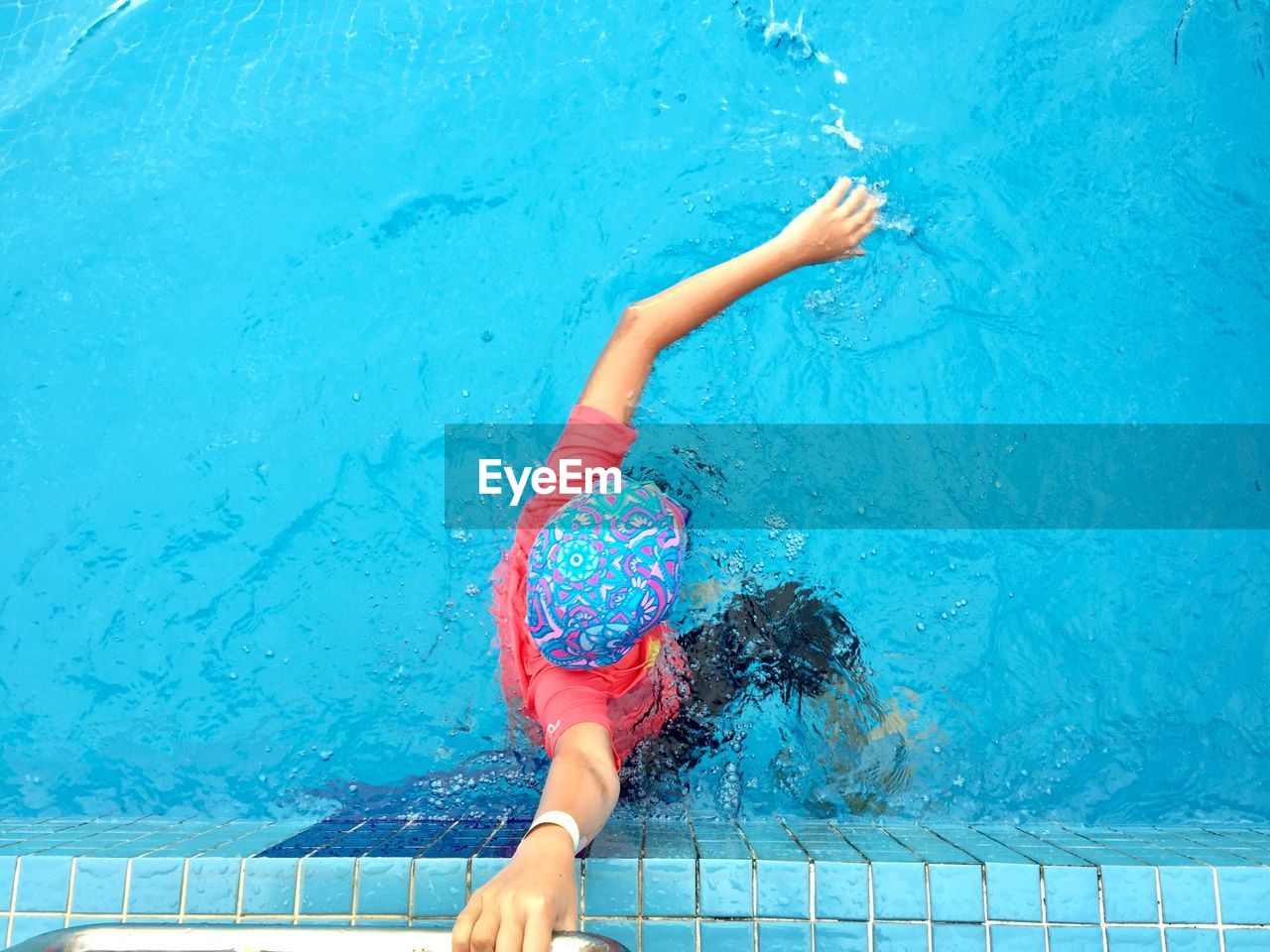 Girl swimming in pool