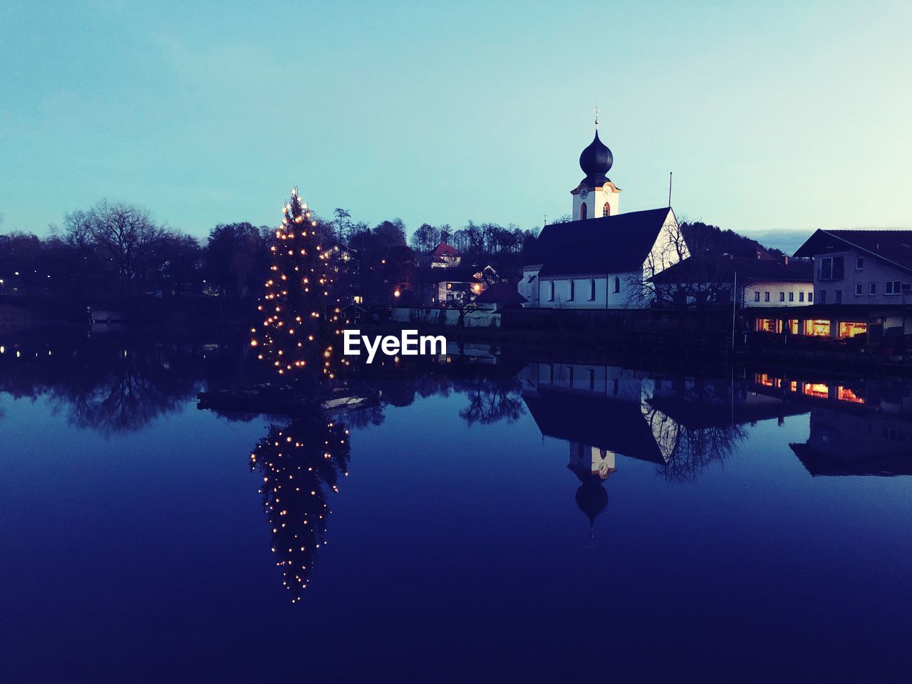 Reflection of buildings in lake