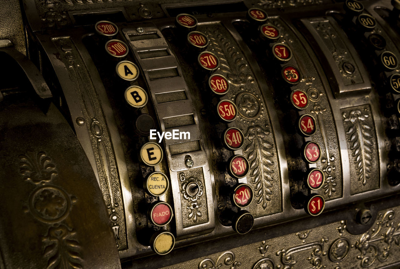 Close-up of old cash register