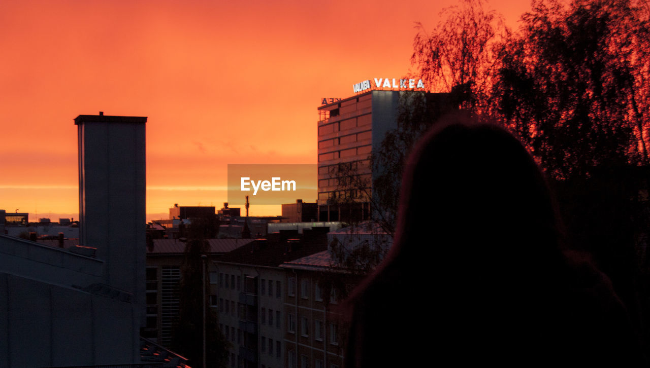 SILHOUETTE OF CITY AT SUNSET