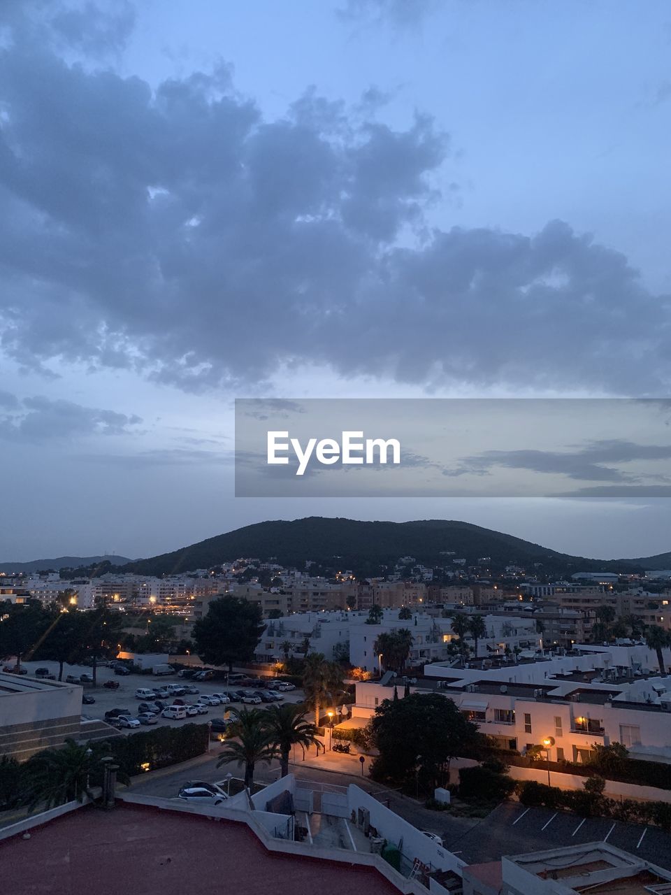 High angle view of illuminated buildings in city against sky