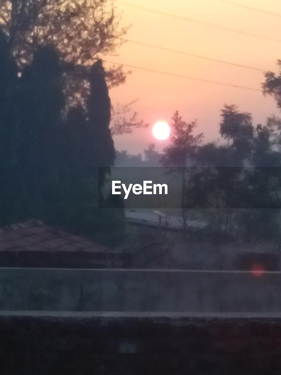 ROAD AGAINST SKY DURING SUNSET