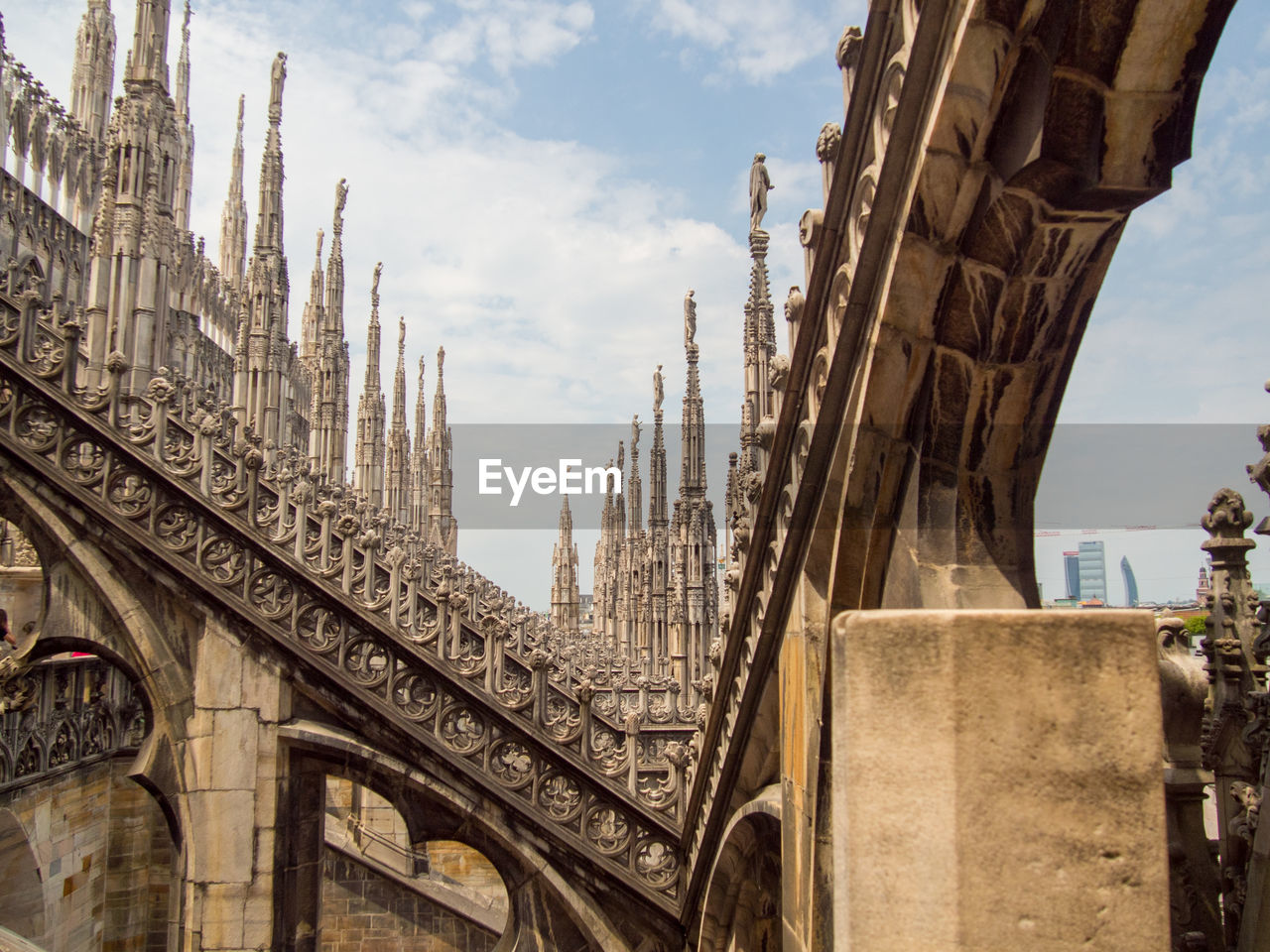 Low angle view of milan cathedral against sky