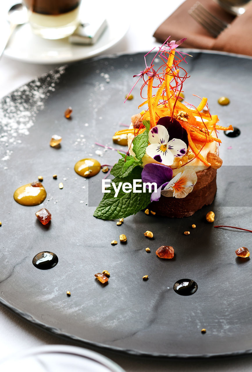 High angle view of food in plate over white background