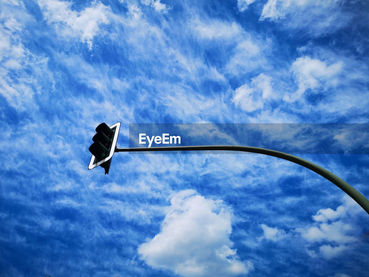 Low angle view of street light against sky