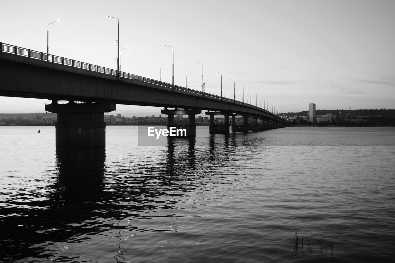 BRIDGE OVER RIVER AGAINST SKY