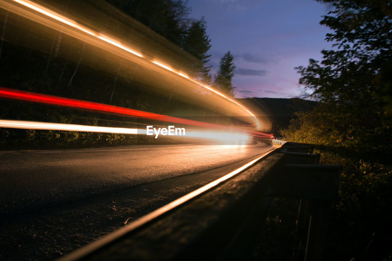 Light trails on road at night