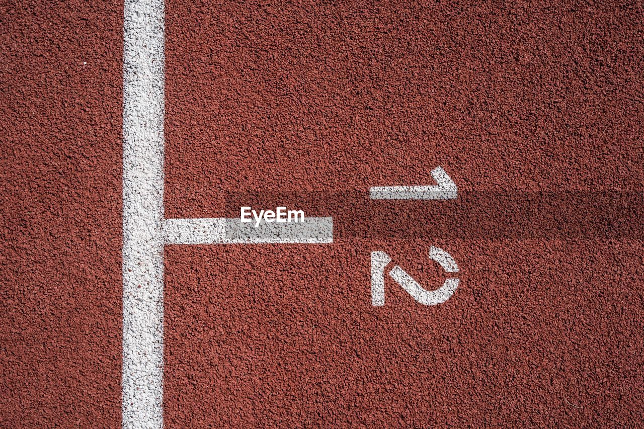 High angle view of numbers on sports track
