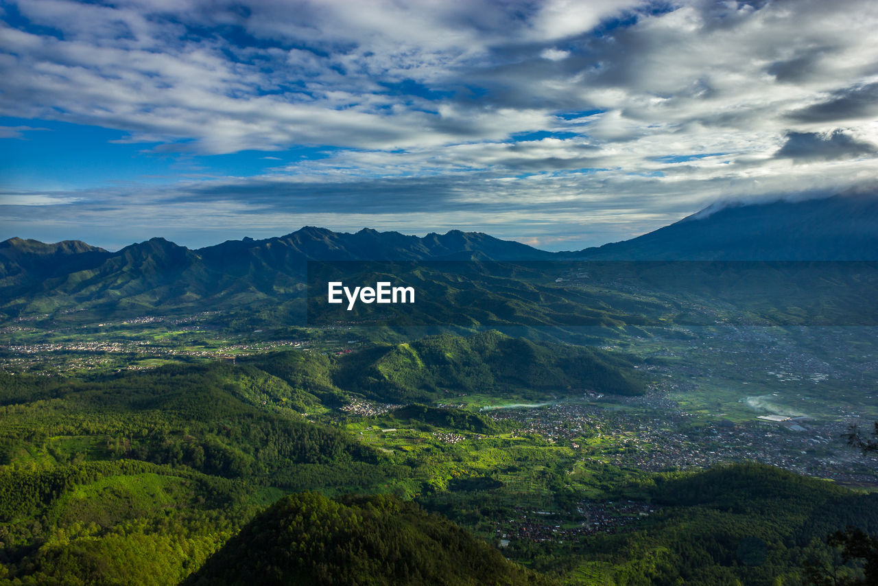 Scenic view of landscape from the mountain against blue sky