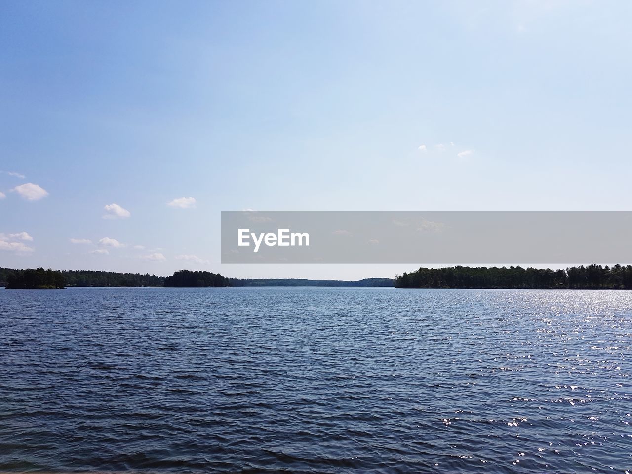 VIEW OF LAKE AGAINST SKY