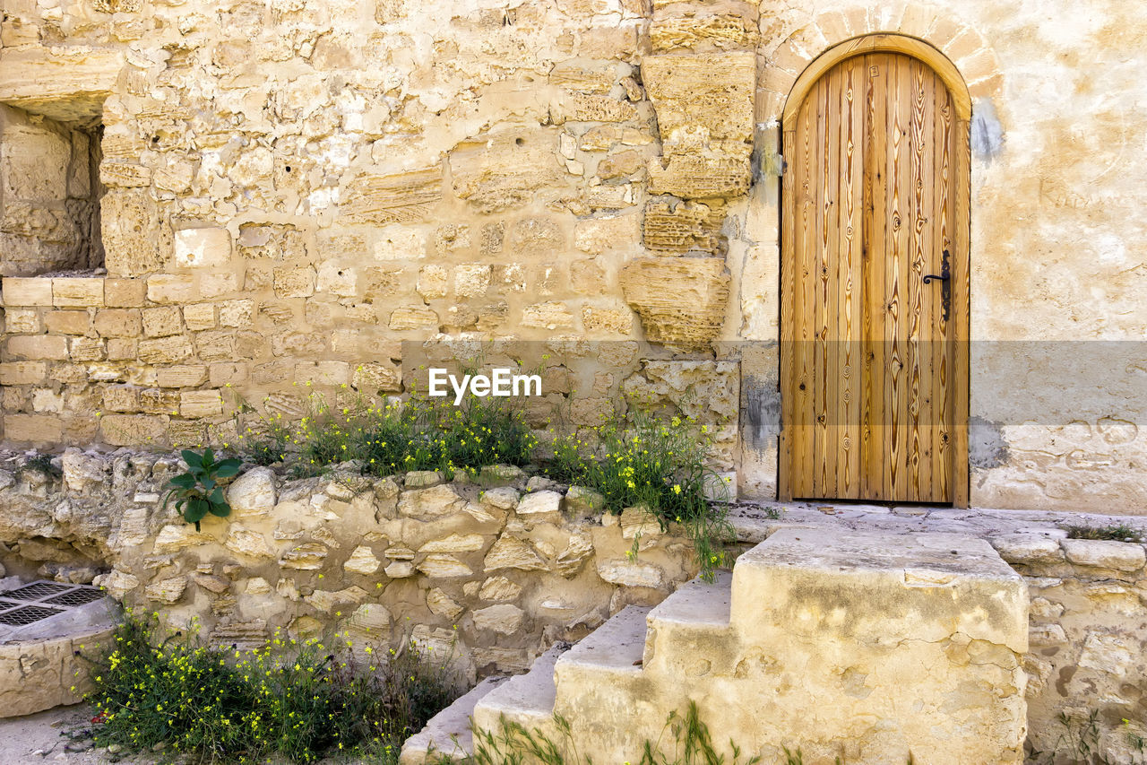 STONE WALL OF OLD HOUSE