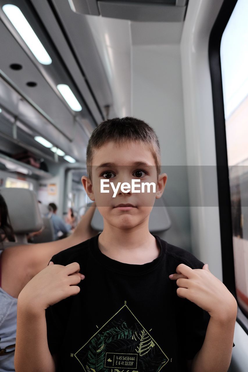 Boy sitting in train