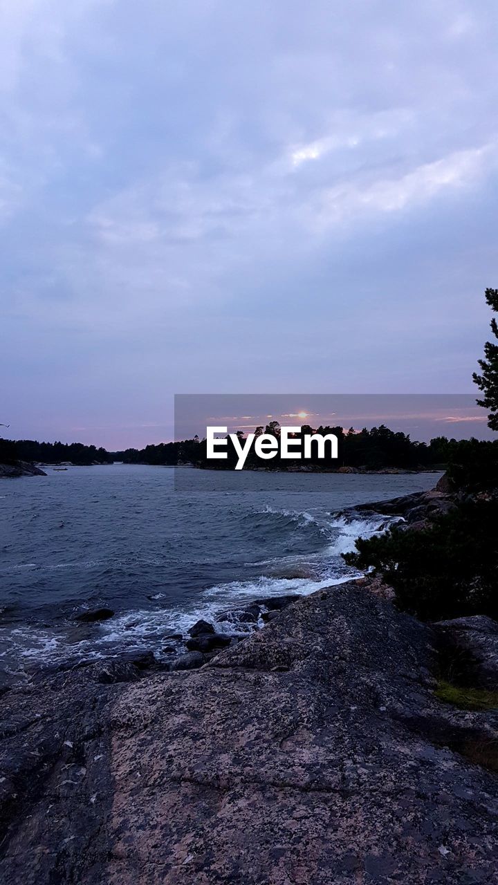 VIEW OF BEACH AGAINST SKY