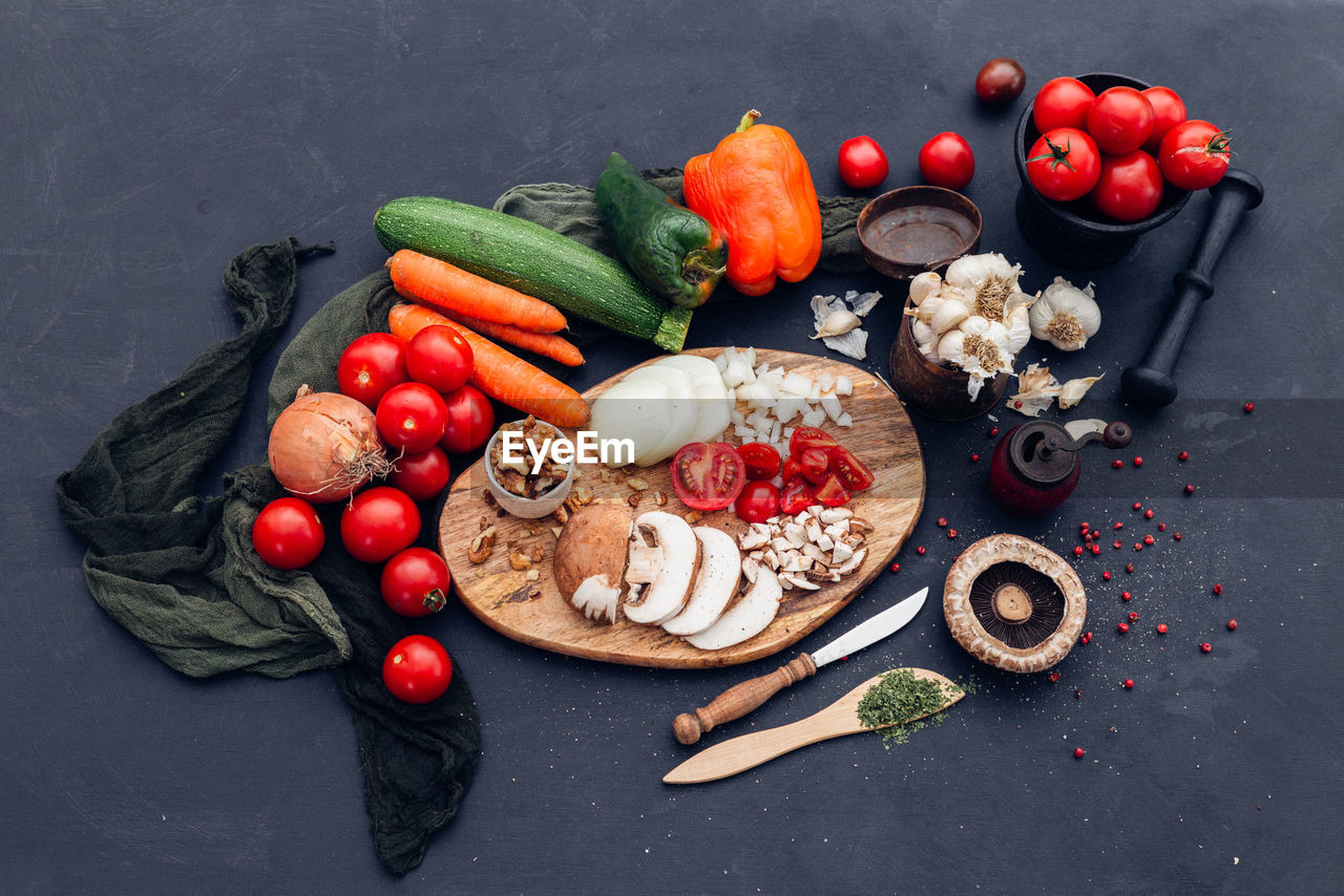 HIGH ANGLE VIEW OF FRUITS AND VEGETABLES ON CONTAINER