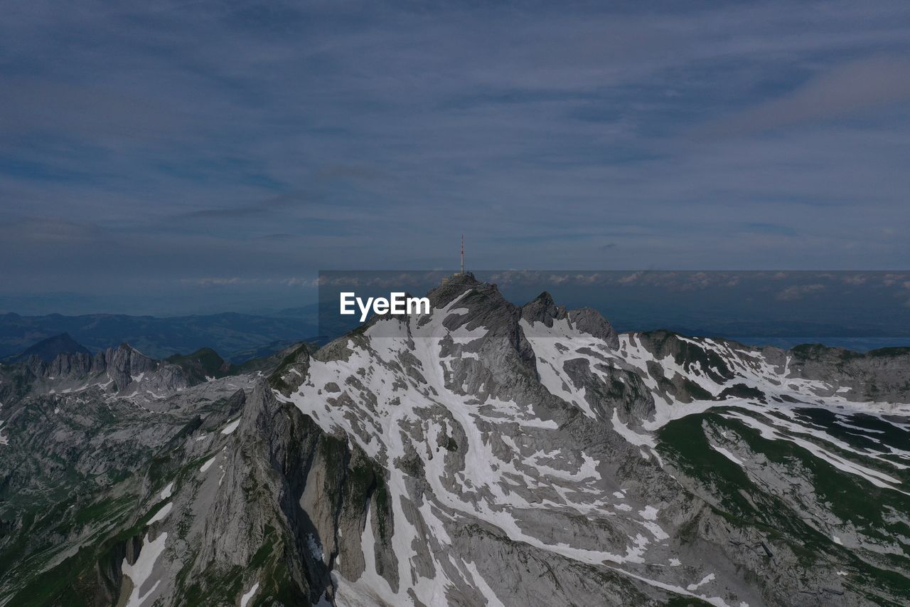 panoramic view of snowcapped mountains against sky