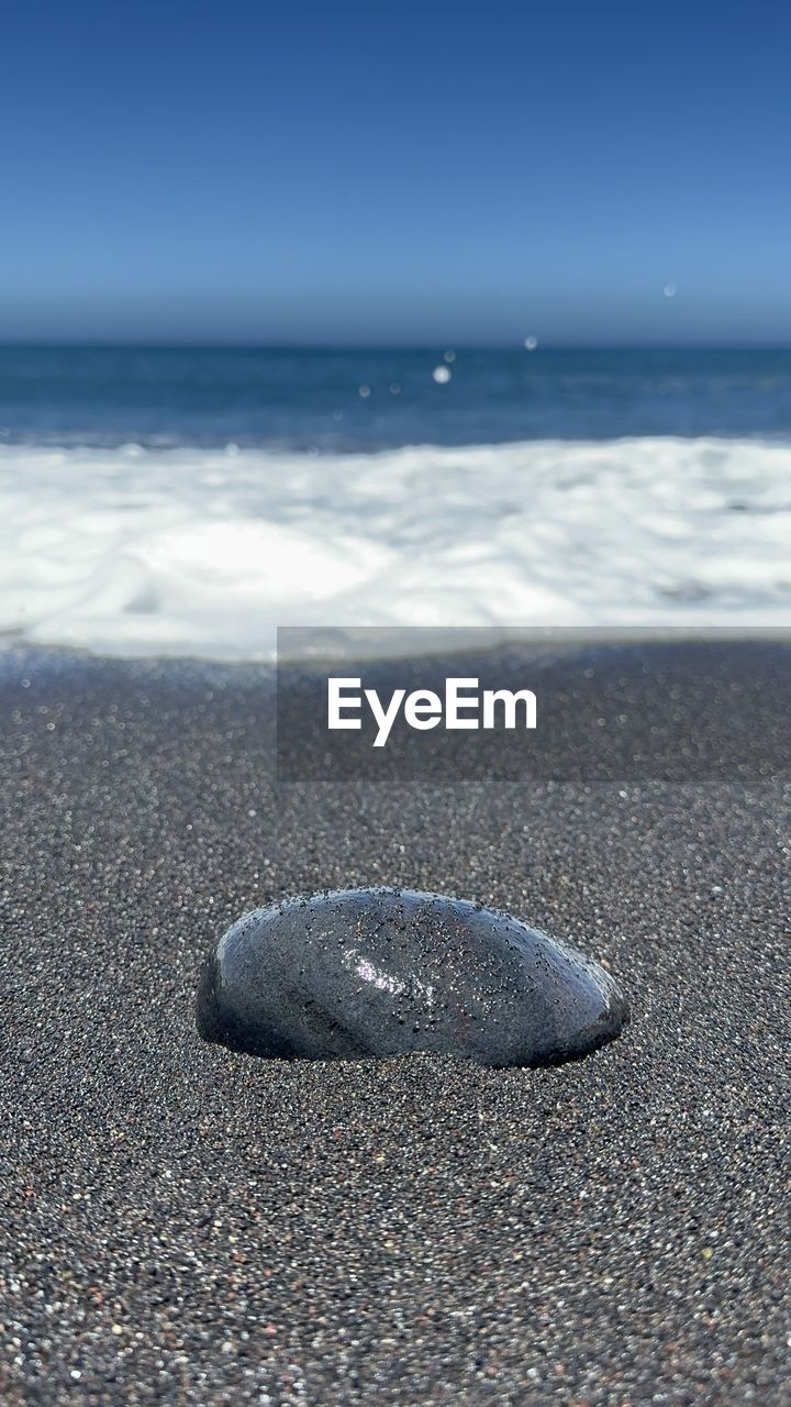 blue, water, sea, nature, no people, day, close-up, beach, outdoors, land, motion, sand, sunlight, wave, textured