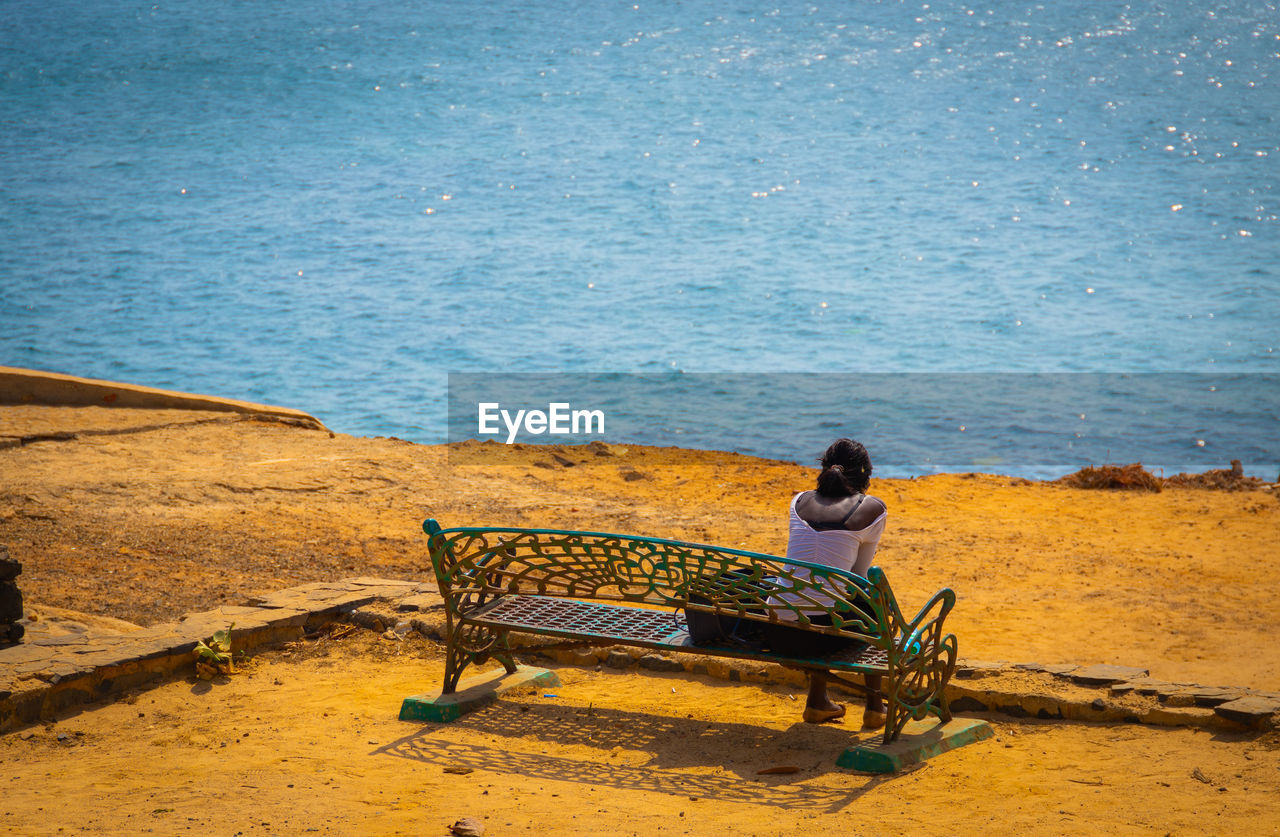 Girl looking at the sea 