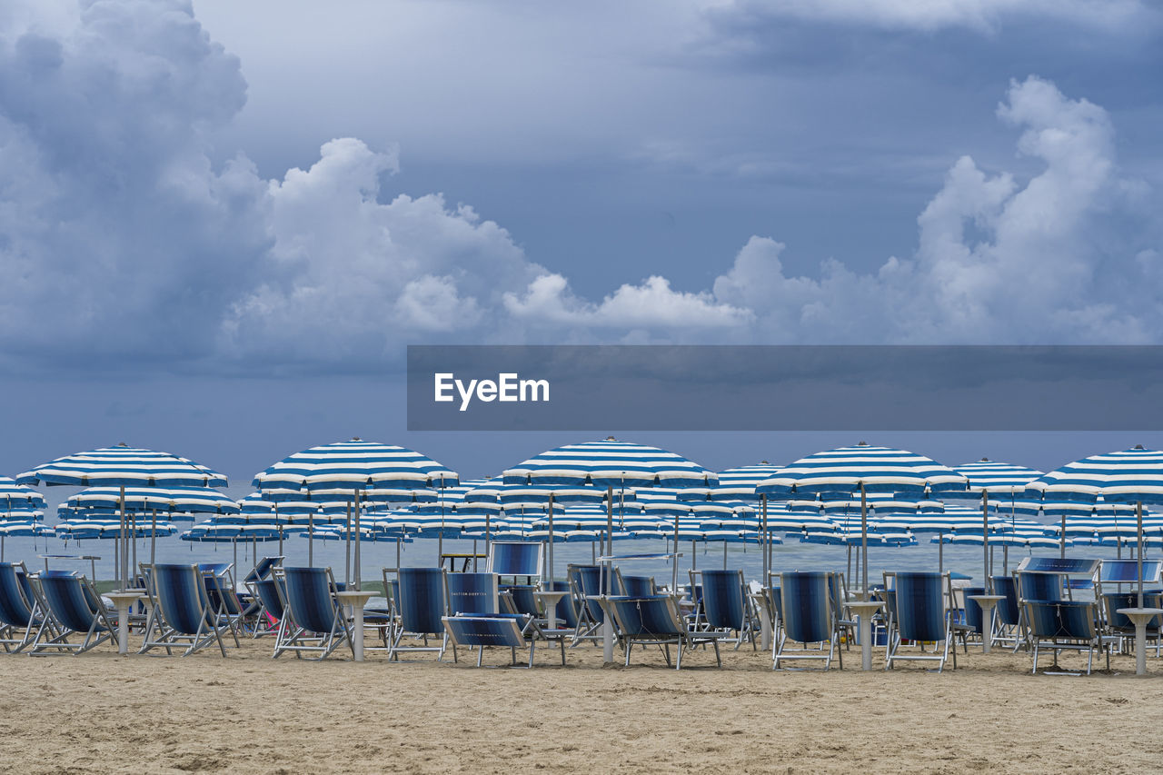 HOODED CHAIRS ON BEACH