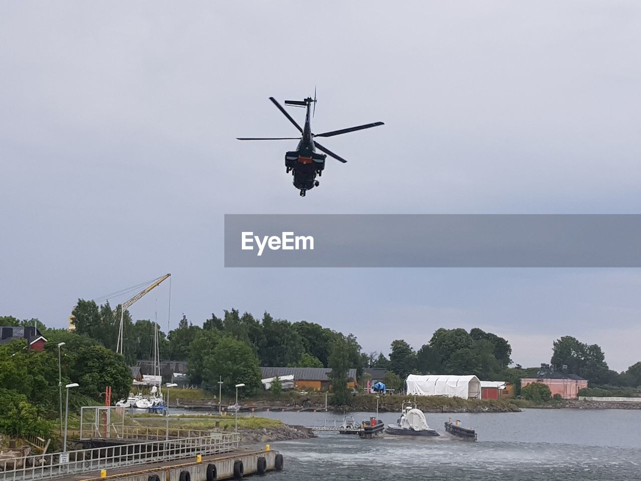 VIEW OF HELICOPTER AGAINST SKY