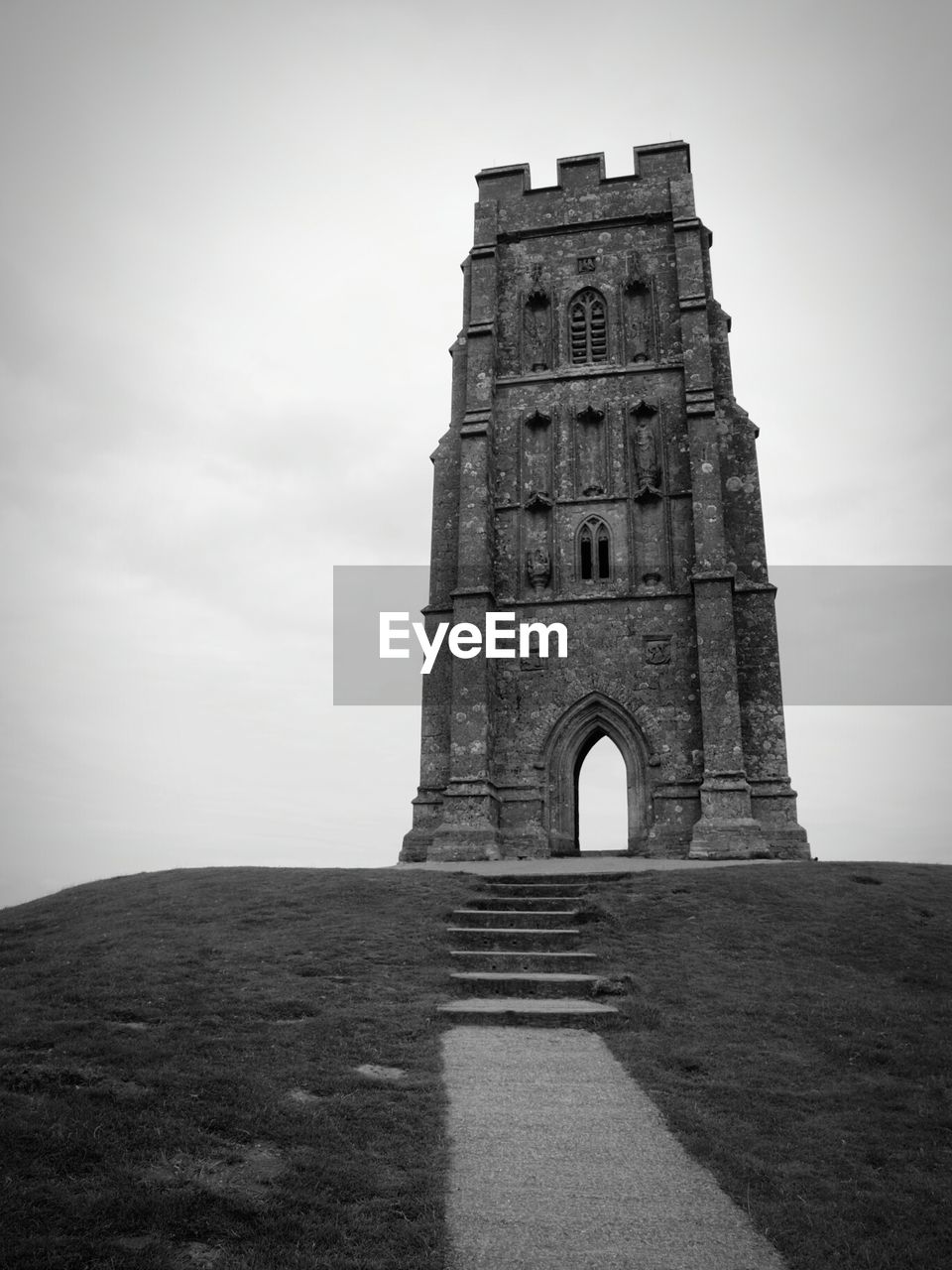 St michaels tower against sky at glastonbury tor