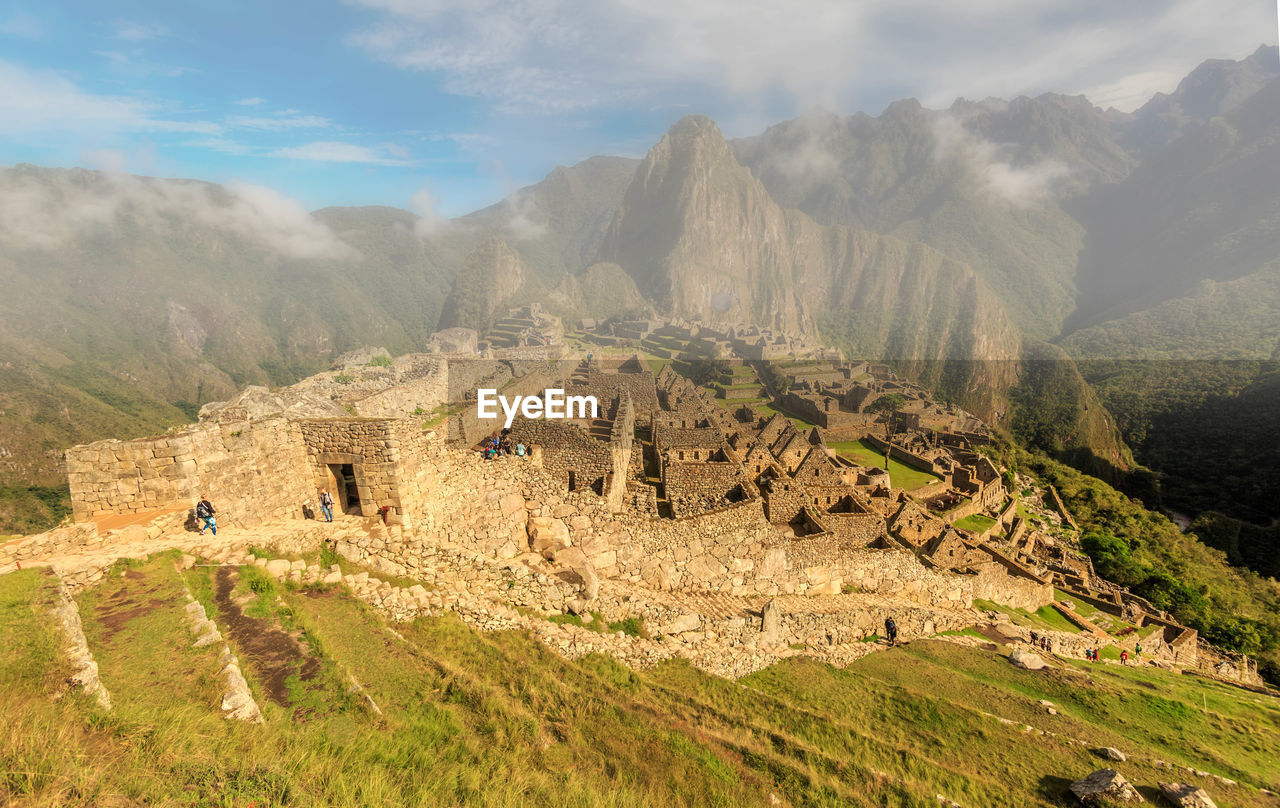 SCENIC VIEW OF MOUNTAIN RANGE AGAINST SKY