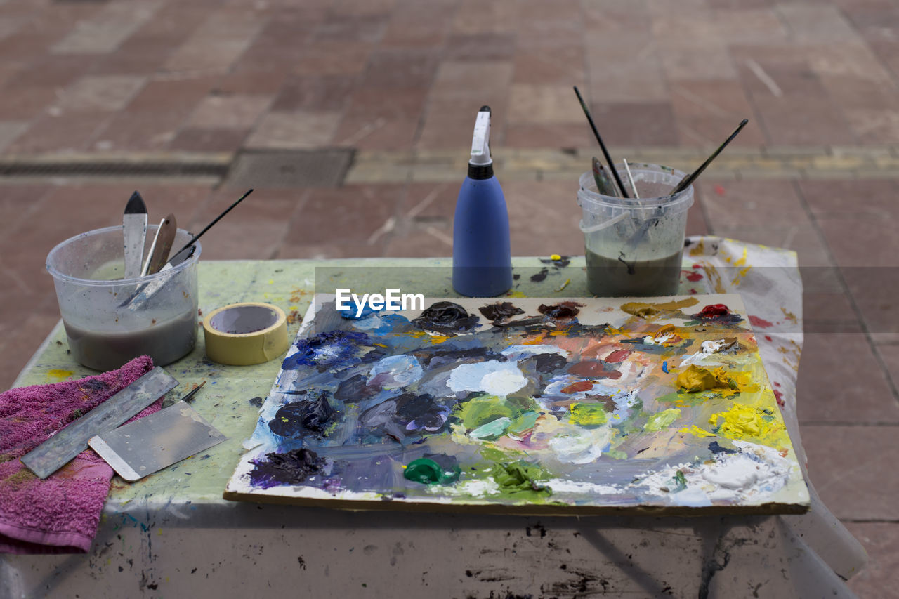 High angle view of art and craft equipment on table