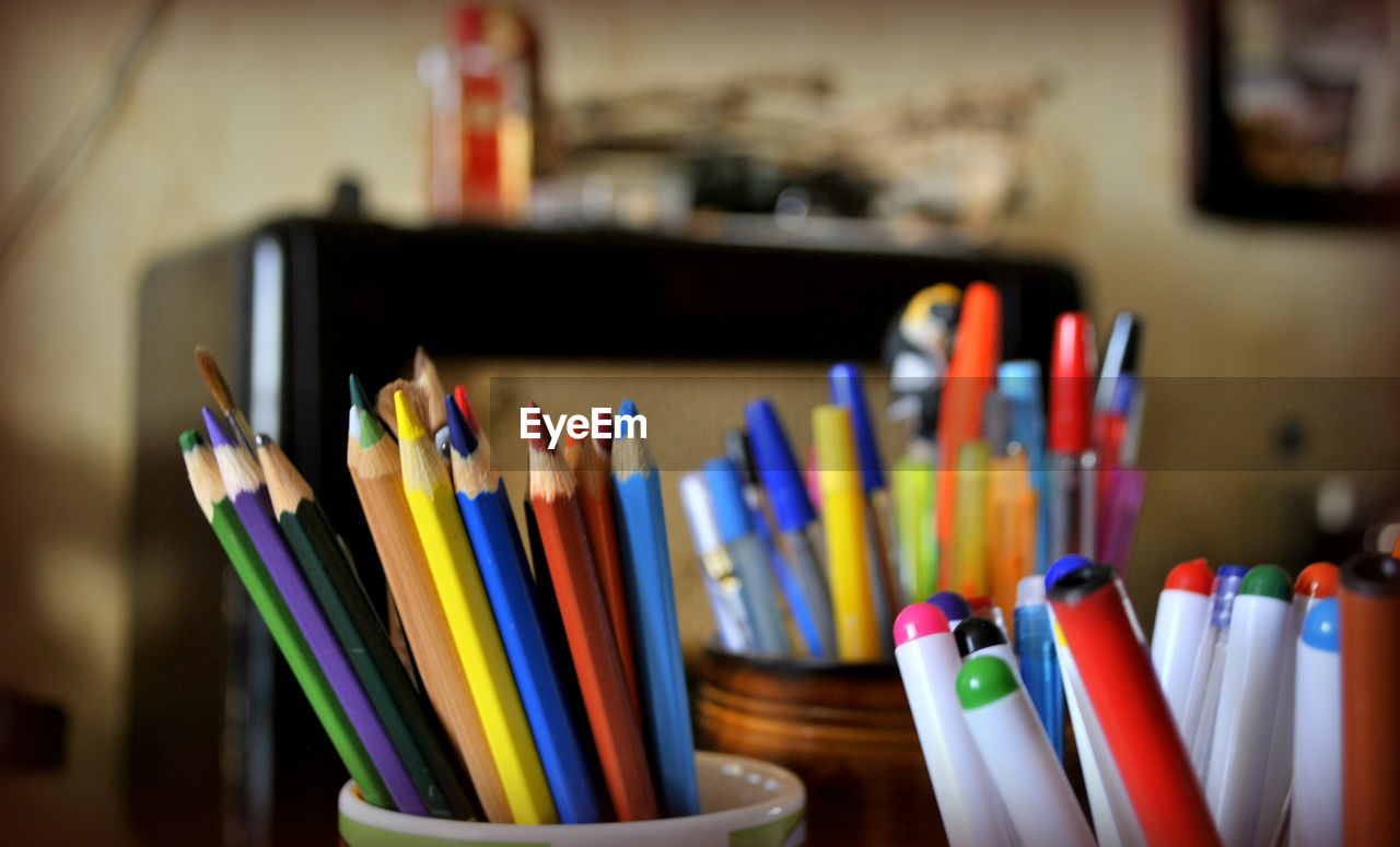 Close-up of colored pencils on table