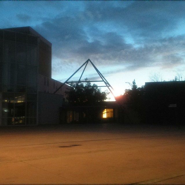 VIEW OF ILLUMINATED BUILDINGS AGAINST SKY