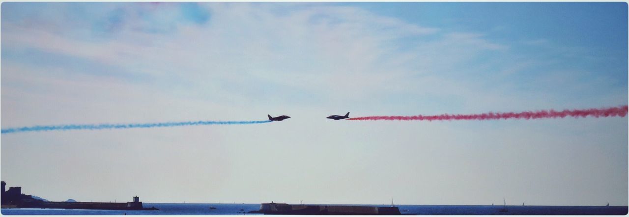 LOW ANGLE VIEW OF AIRSHOW IN SKY