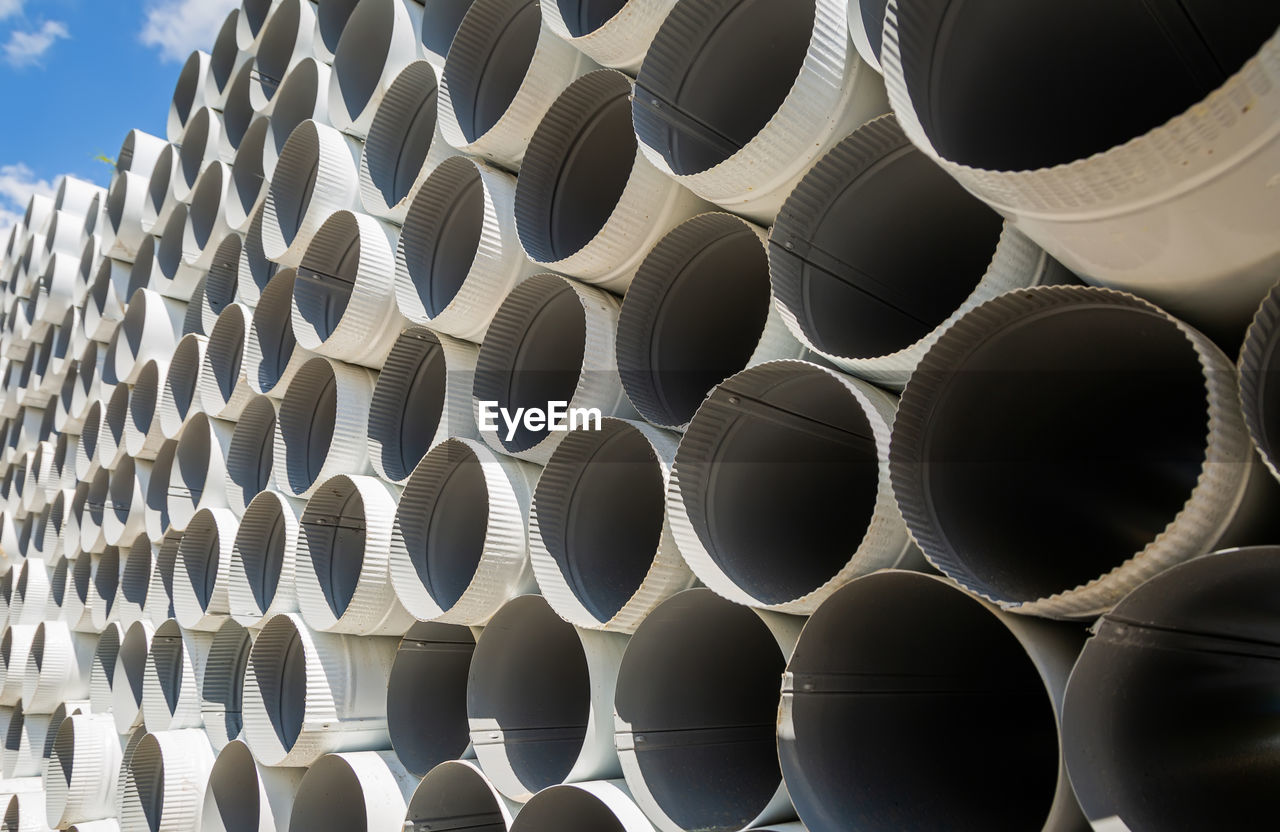 Downpipe warehouse. steel pipes, parts for the construction of a roof drainage system in a warehouse